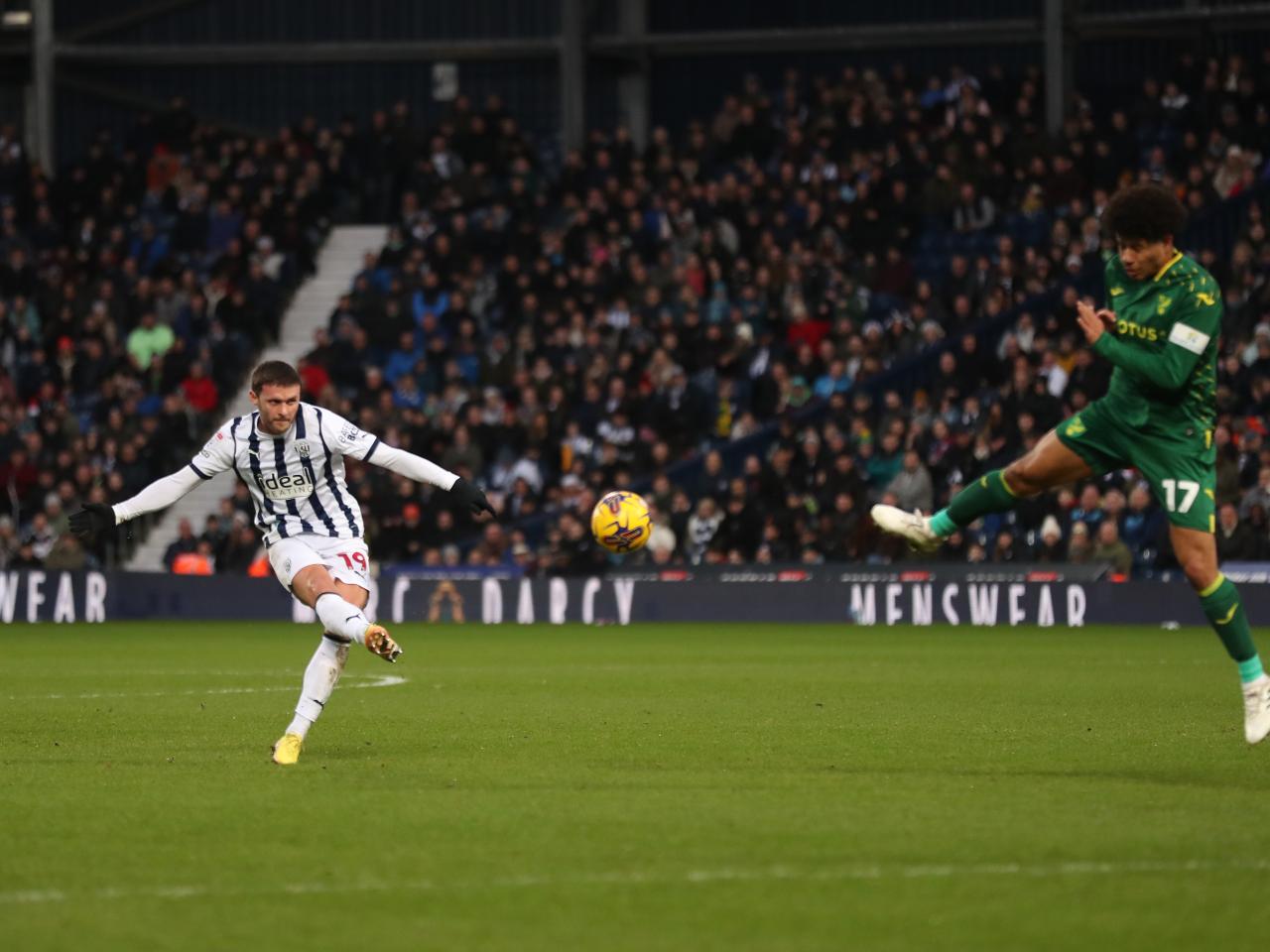 John Swift strikes at goal against Norwich 