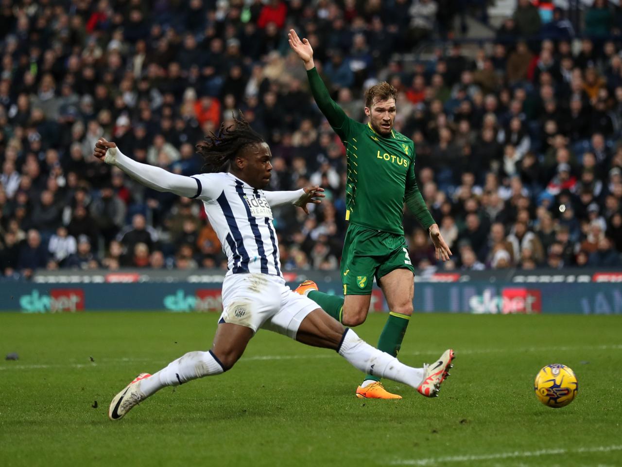 Brandon Thomas-Asante stretches for the ball against Norwich