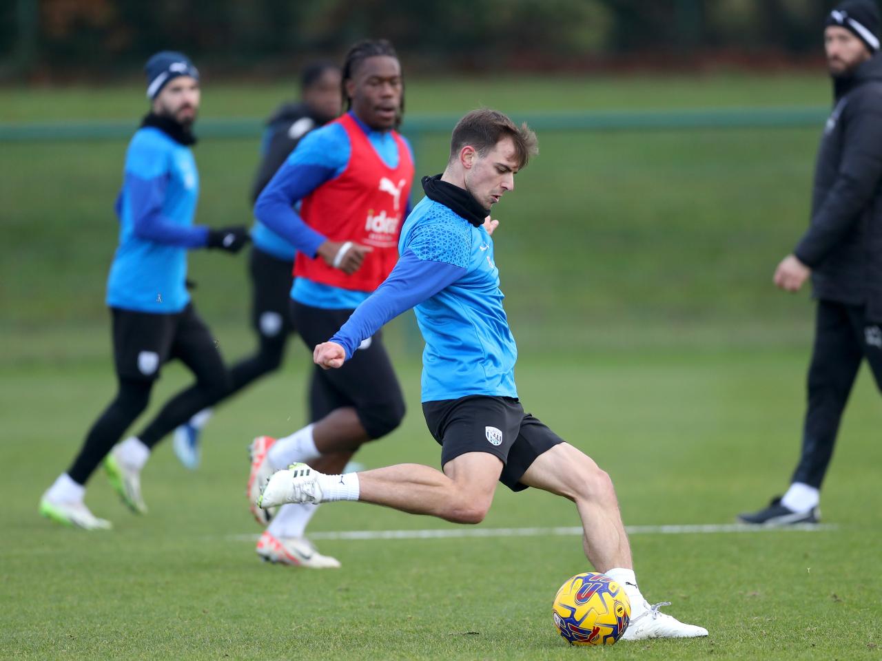 Jayson Molumby makes a pass in training 
