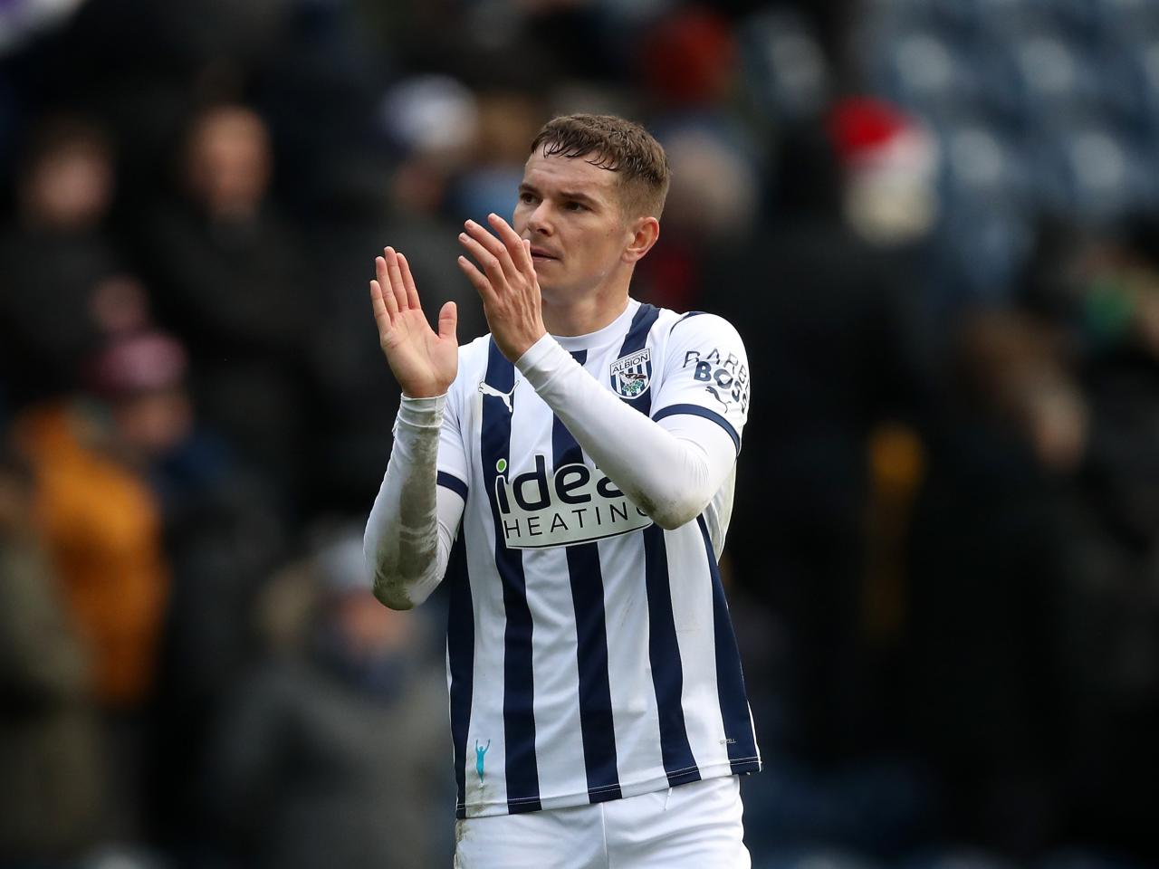 Conor Townsend applauds supporters after the Stoke game