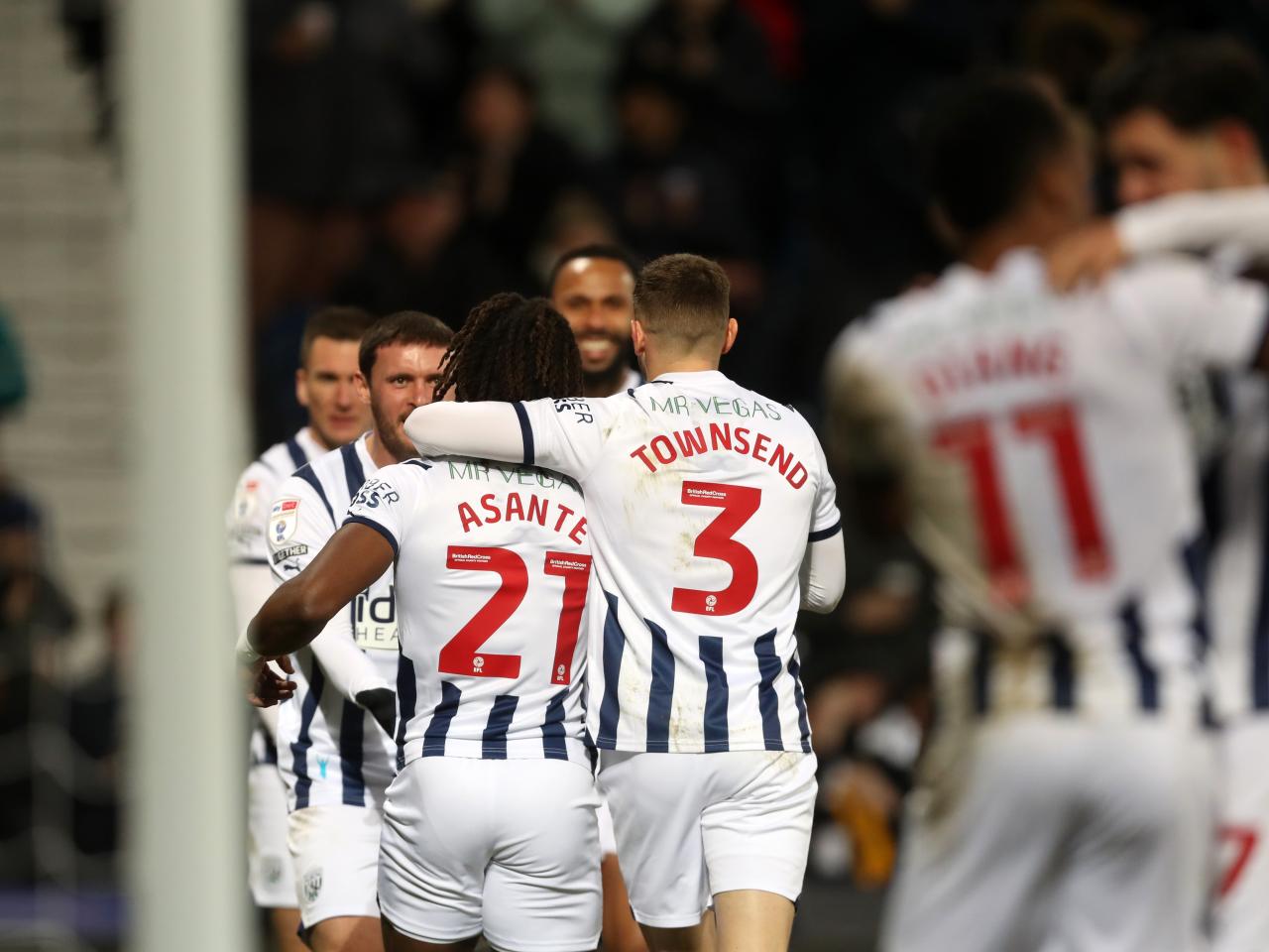 Brandon Thomas-Asante celebrates scoring against Norwich with Conor Townsend