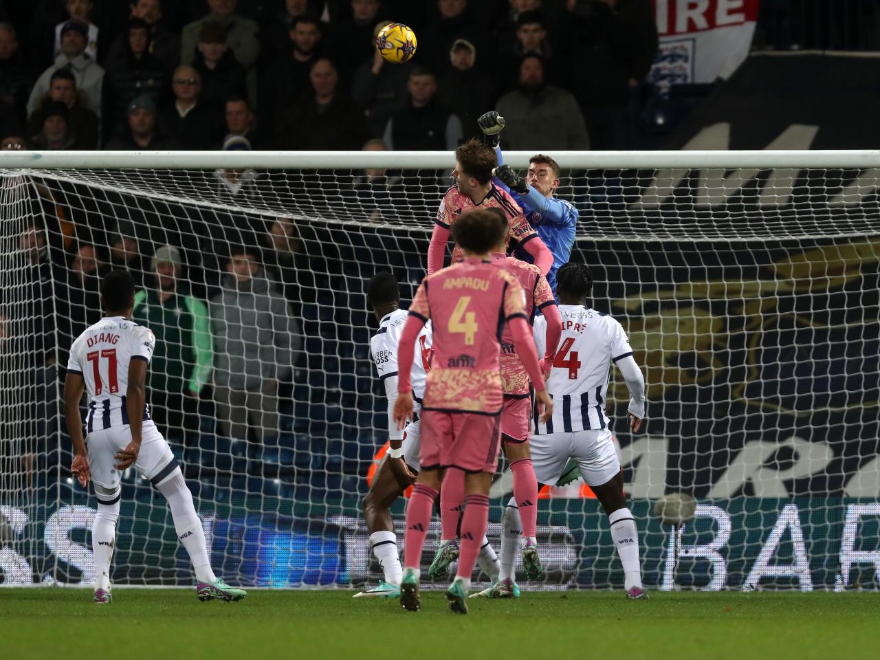 Alex Palmer punches the ball away against Leeds
