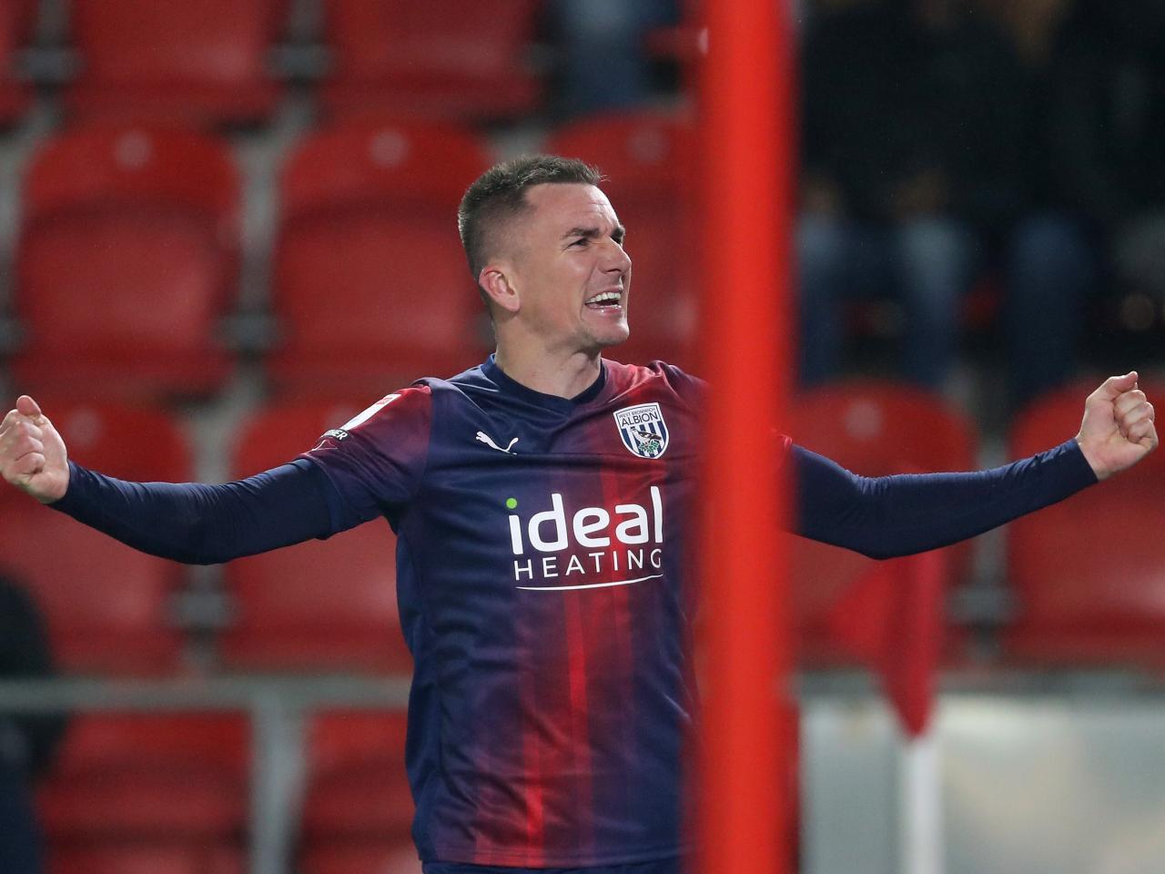 Jed Wallace celebrates scoring at Rotherham