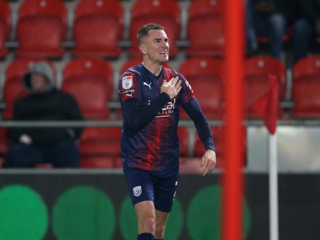 Jed Wallace celebrates scoring at Rotherham