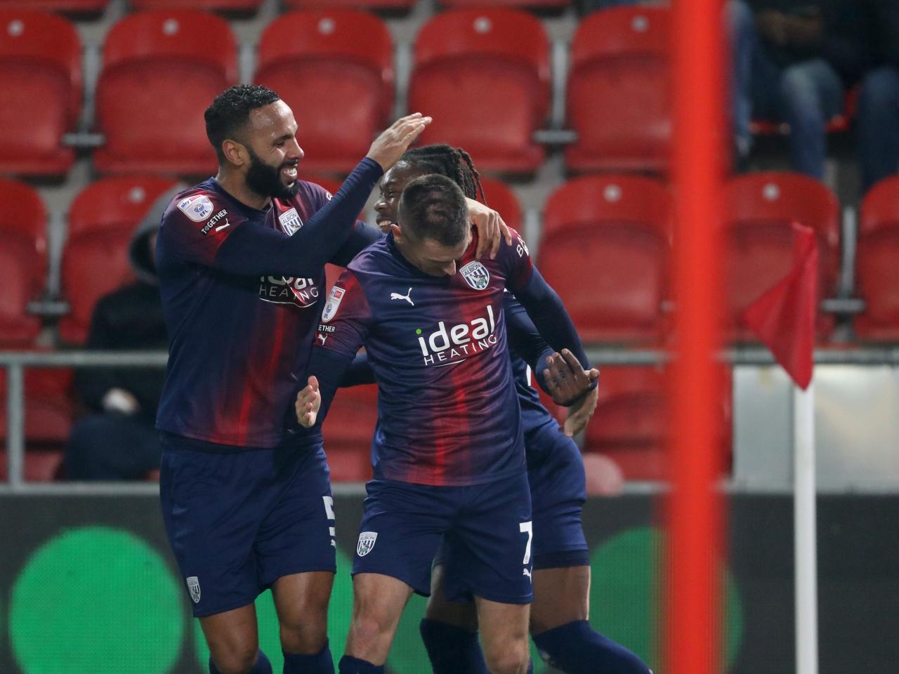 Jed Wallace celebrates scoring against Rotherham with his team-mates