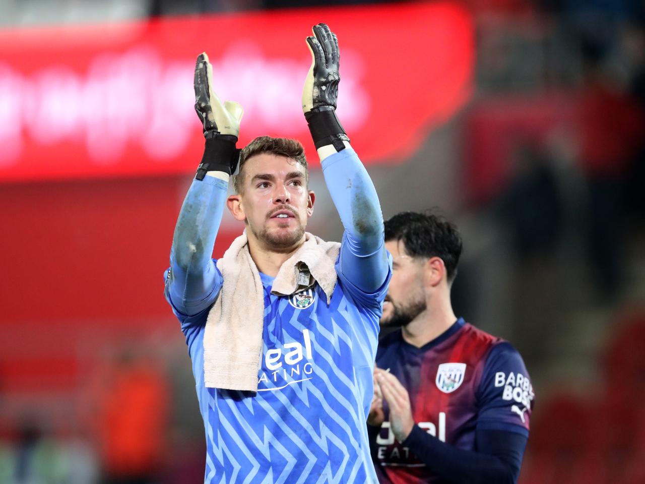 Alex Palmer applauds Albion fans after the match