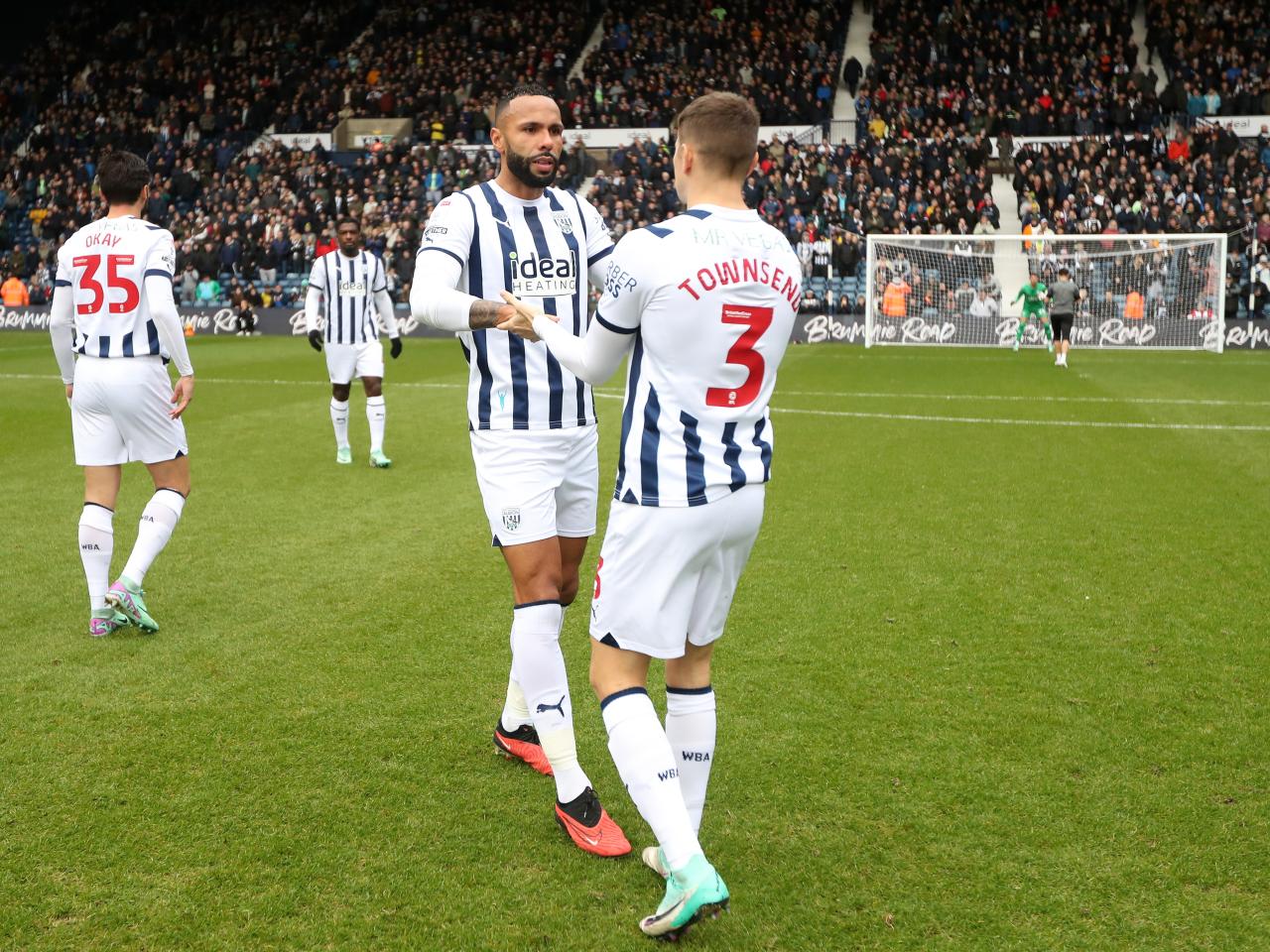 Kyle Bartley and Conor Townsend on the pitch at The Hawthorns ahead of kick-off against Stoke