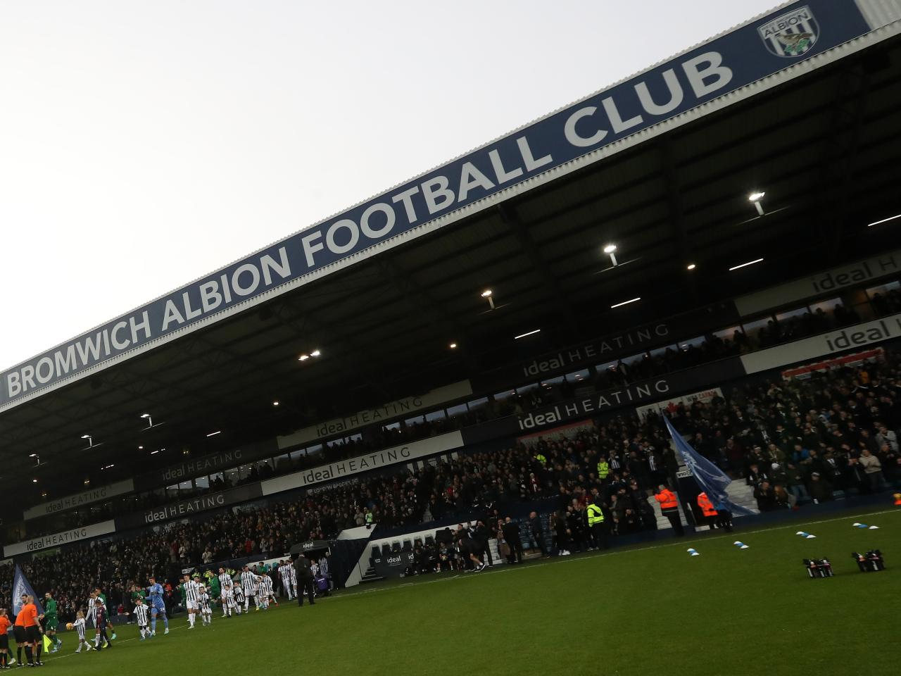 Albion and Norwich players come out of the tunnel before the game