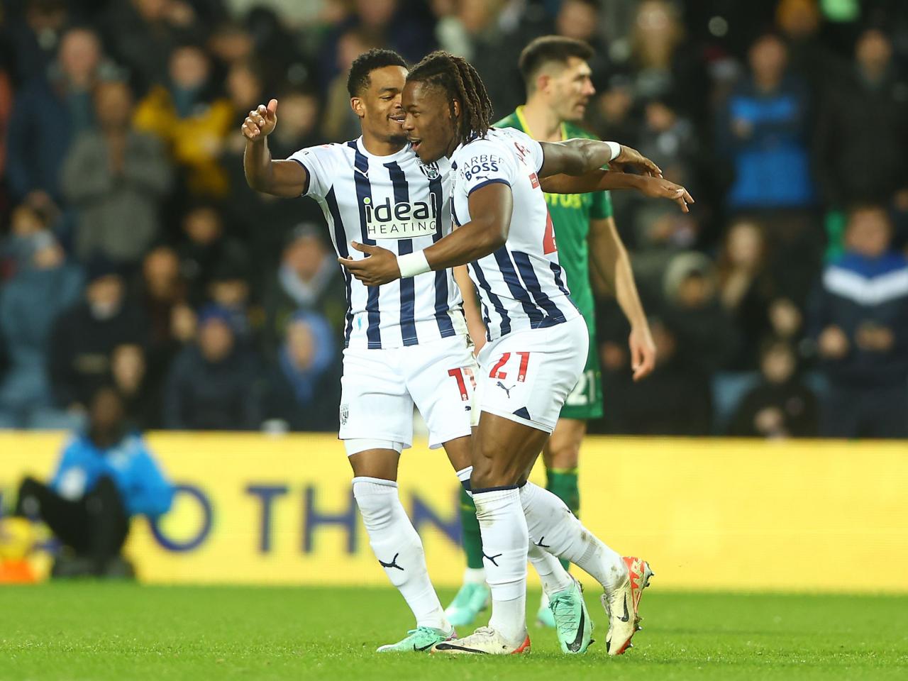 Brandon Thomas-Asante celebrates scoring against Norwich with Grady Diangana