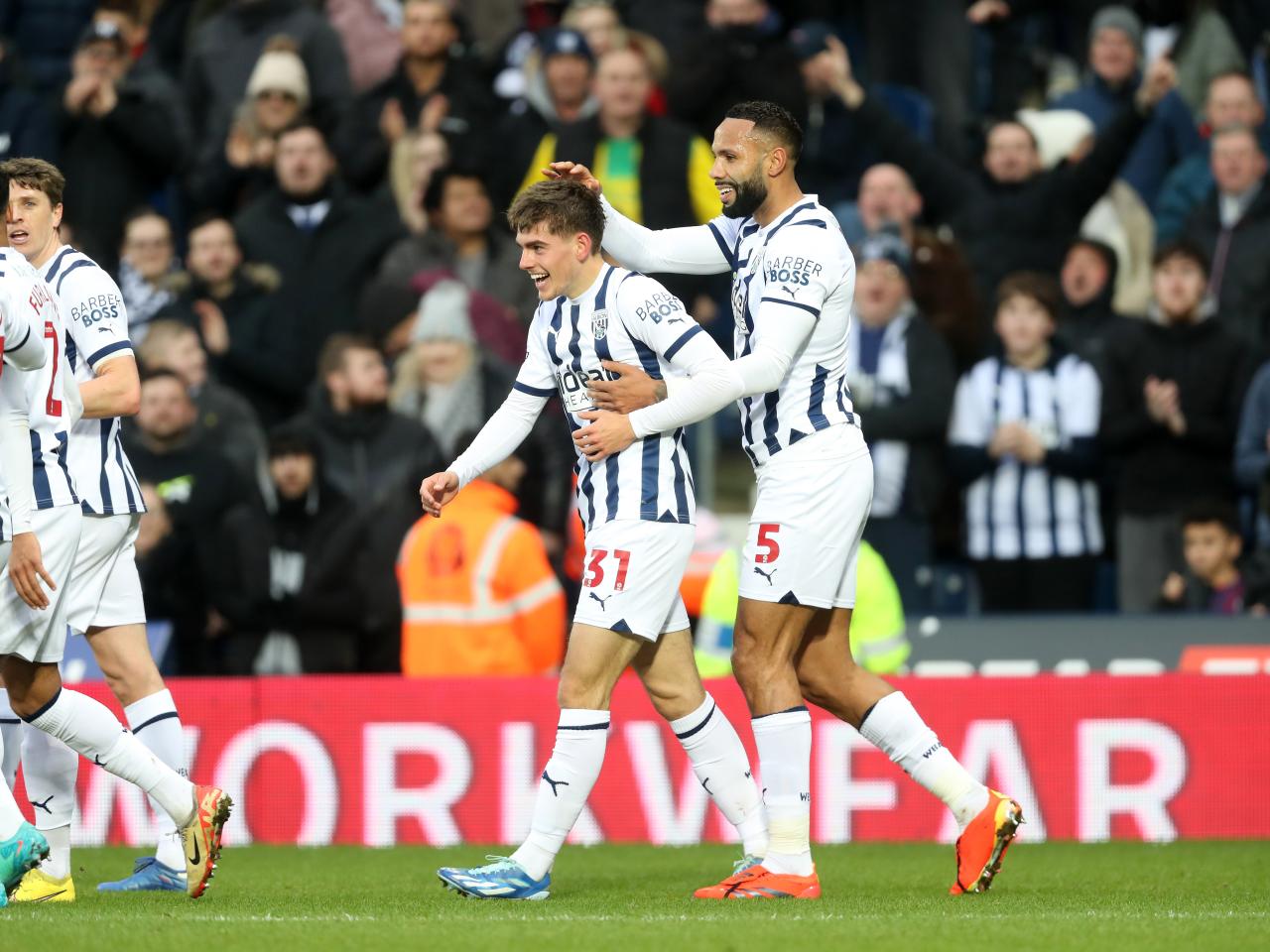 Kyle Bartley celebrates with Tom Fellows after his Blackburn goal