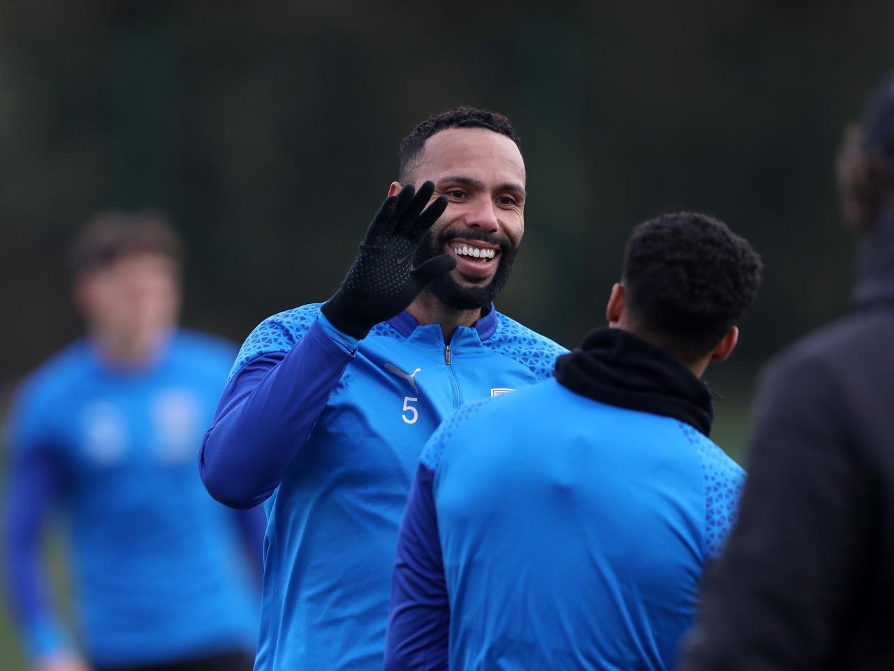 Kyle Bartley smiling during training 