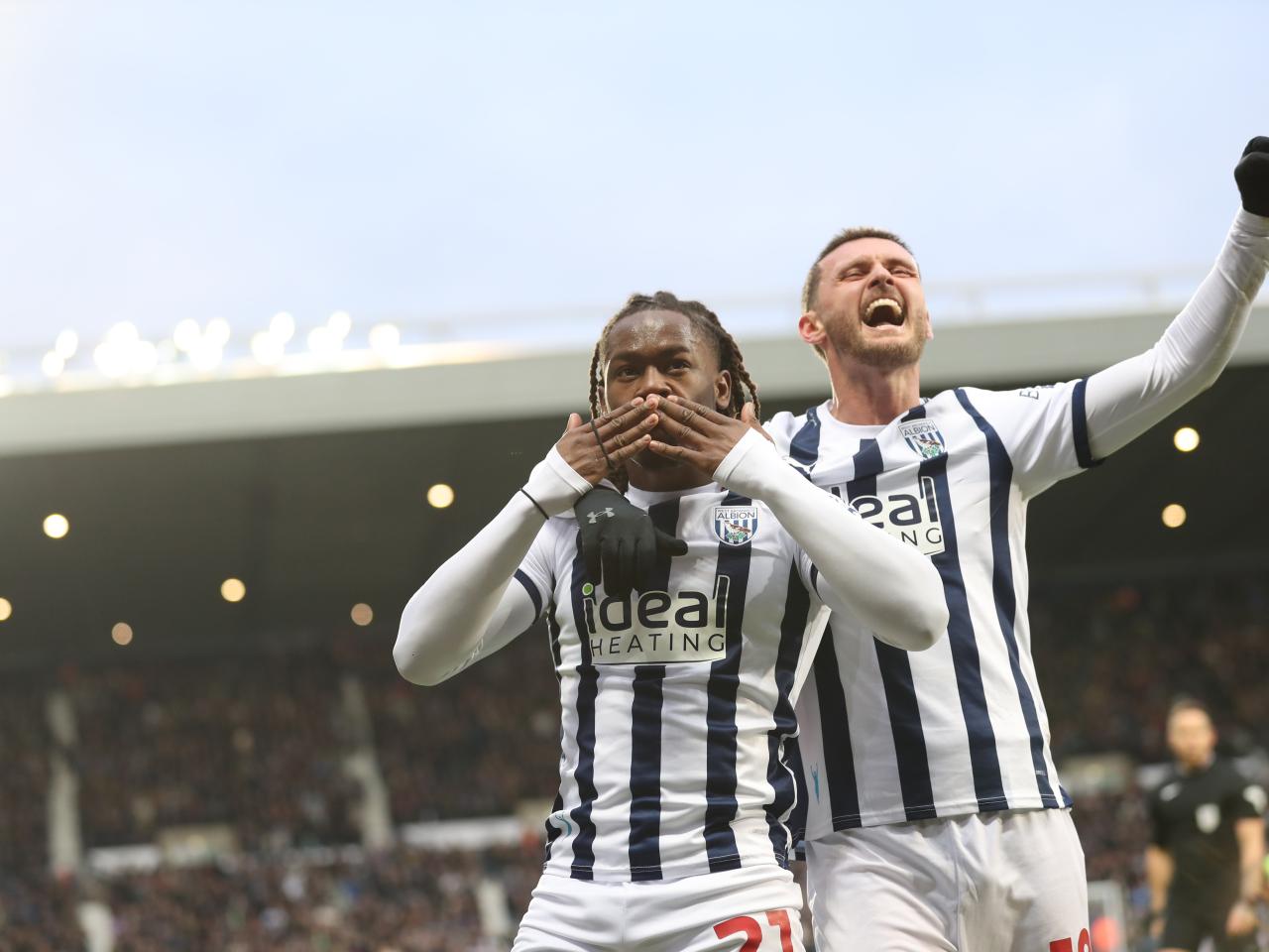 Brandon Thomas-Asante celebrates scoring against Blackburn with John Swift