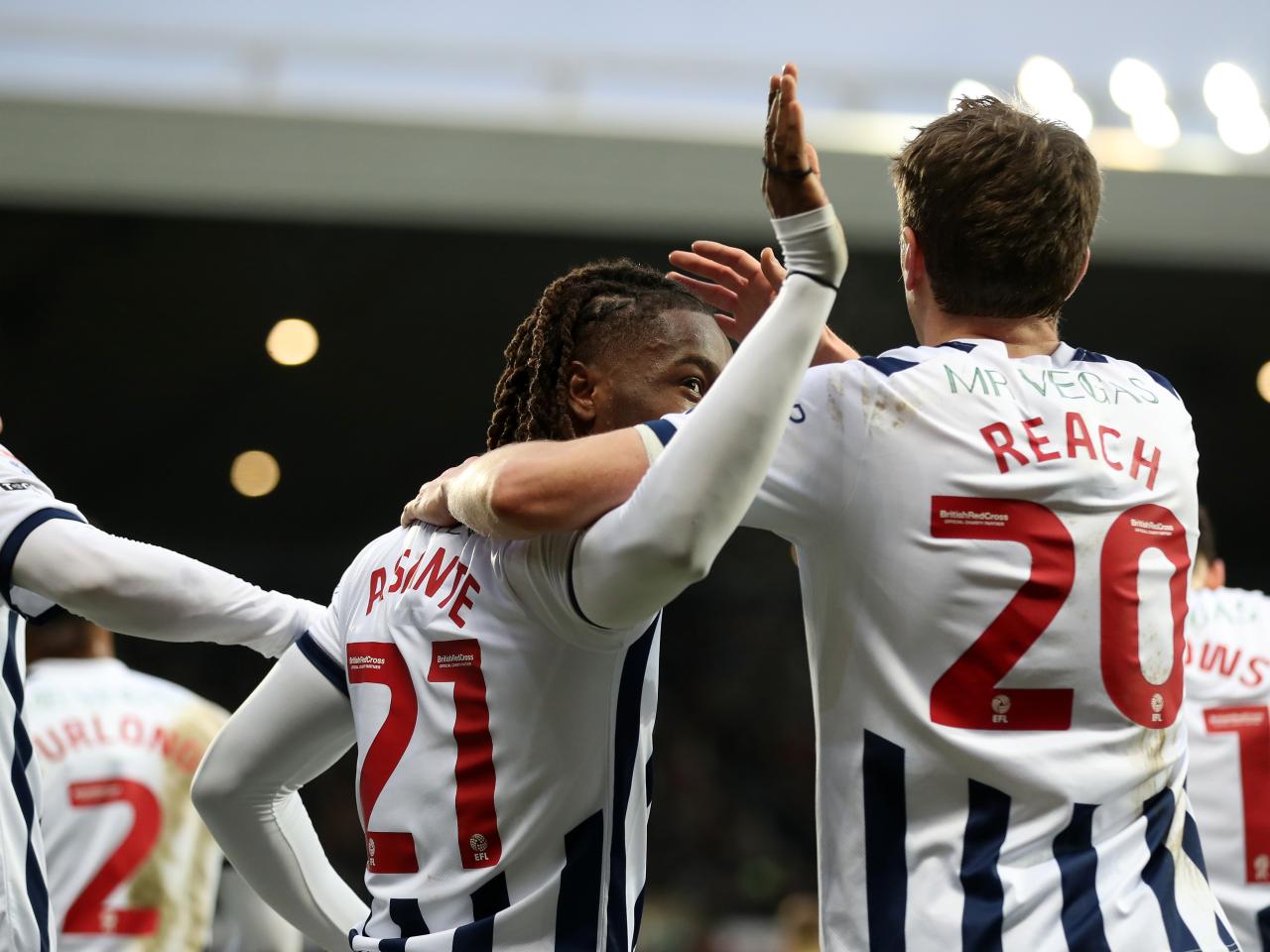 Brandon Thomas-Asante celebrates scoring against Blackburn with Adam Reach