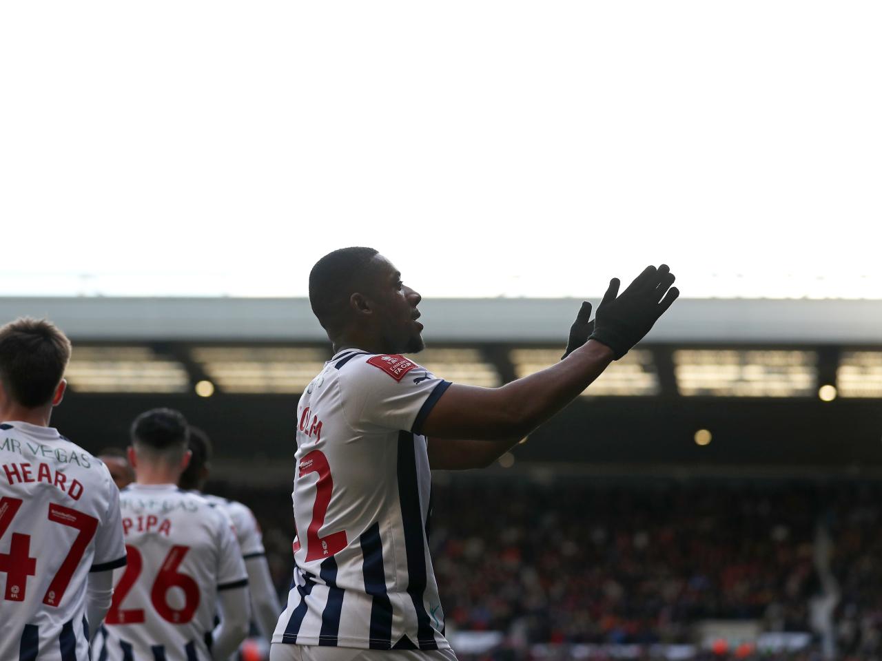 Jovan Malcolm celebrates scoring against Aldershot
