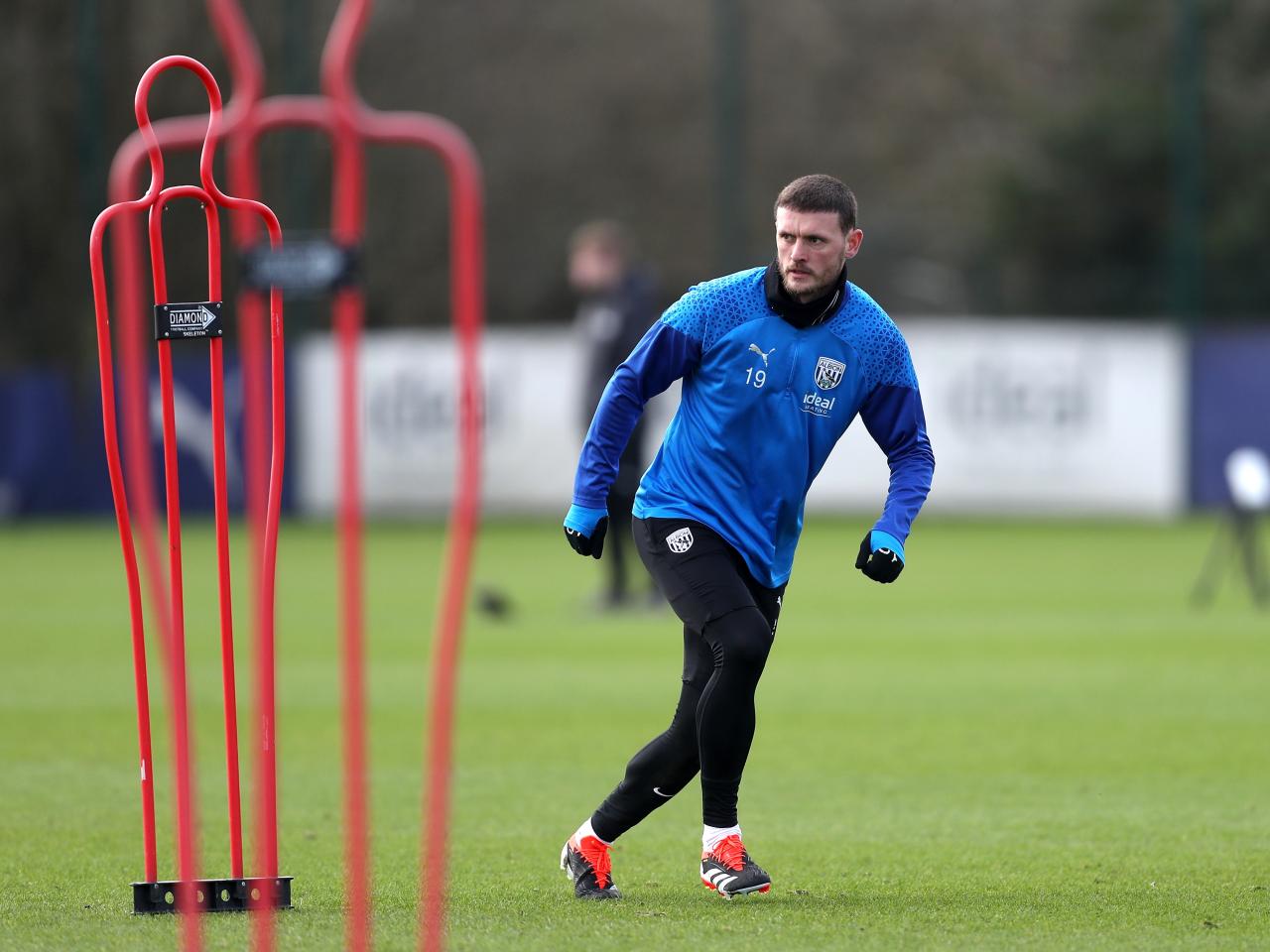 John Swift watches the ball in training 