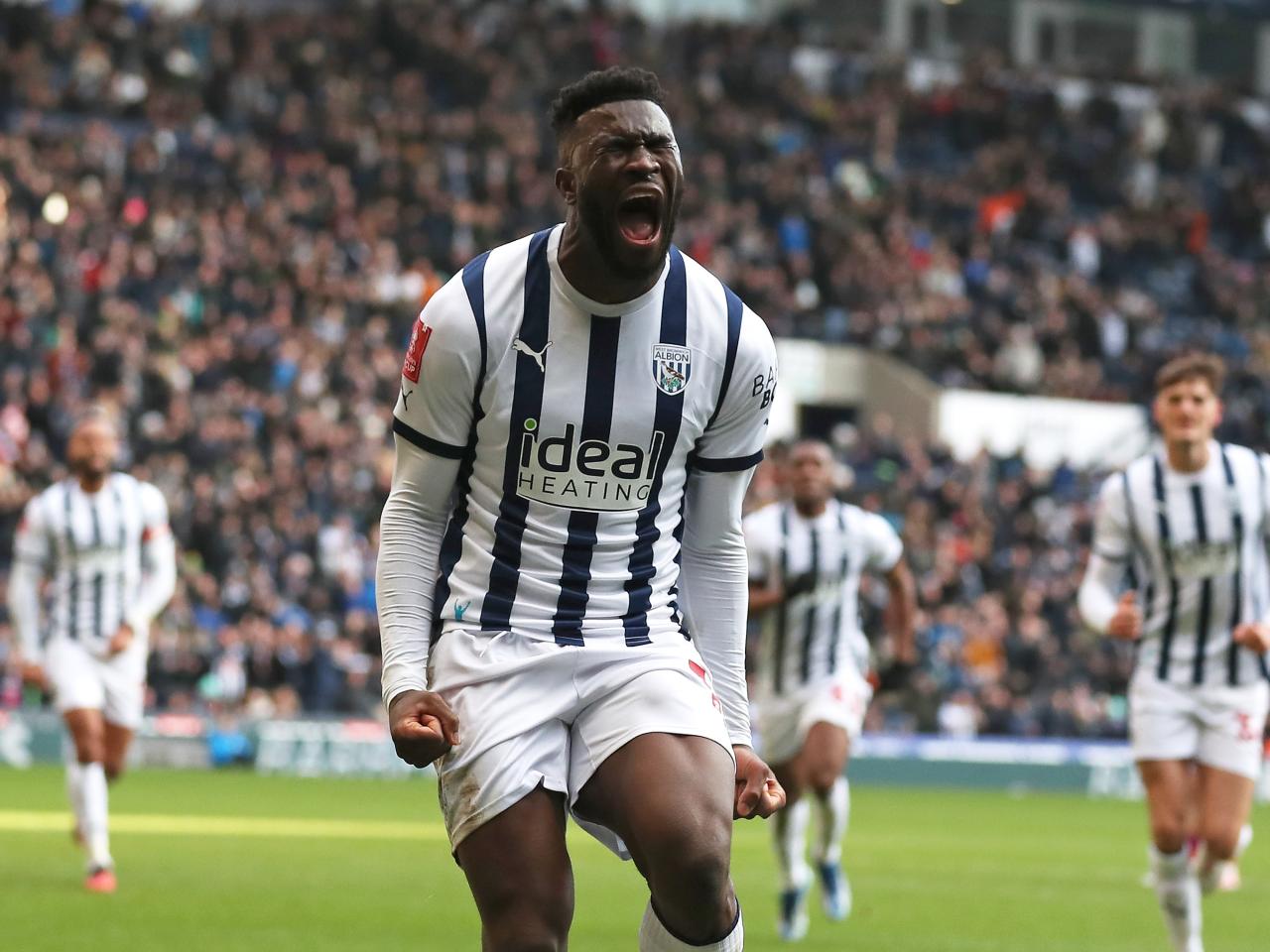 Daryl Dike celebrates scoring against Aldershot