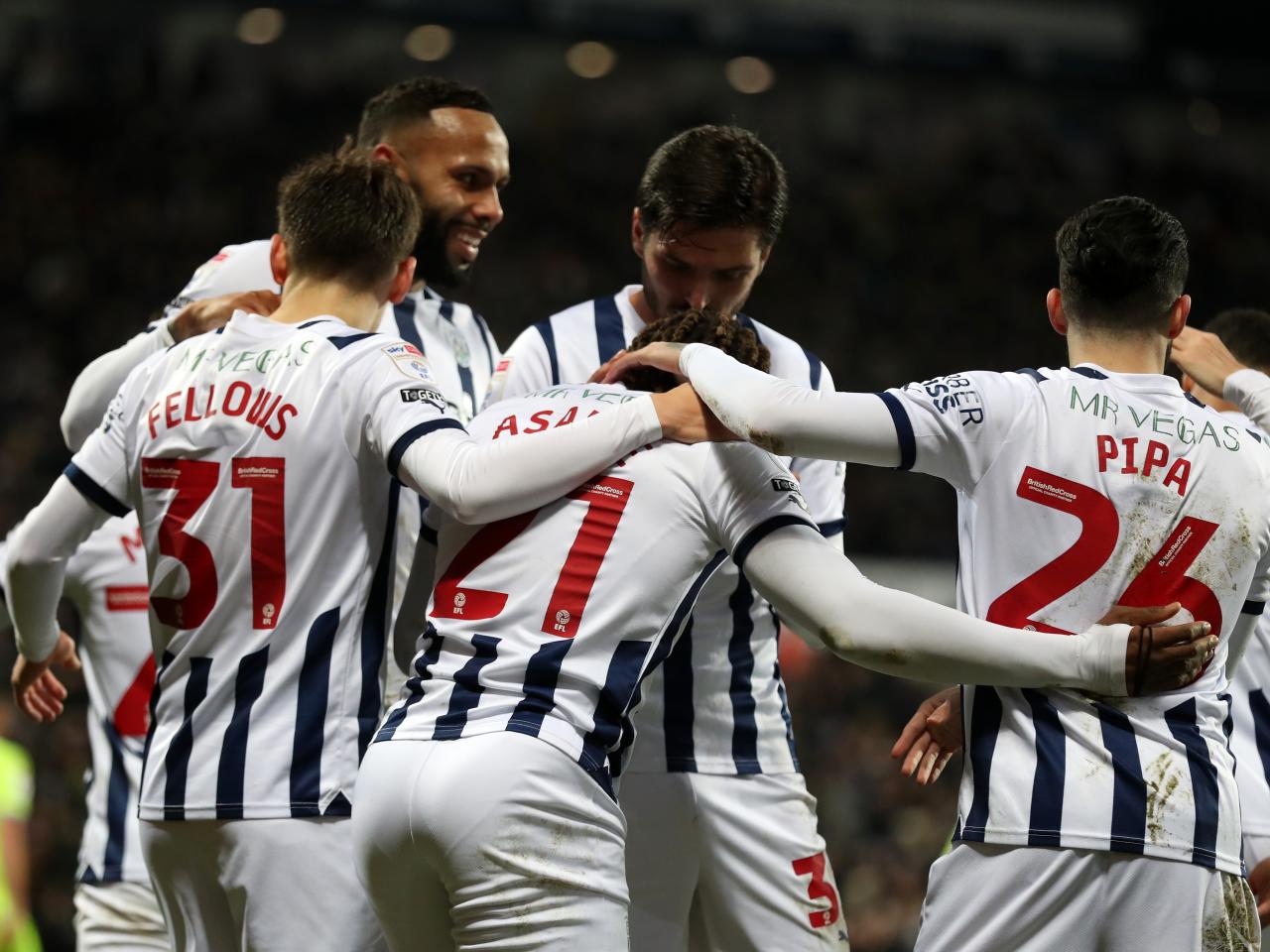 Brandon Thomas-Asante celebrates scoring his second against Blackburn with team-mates