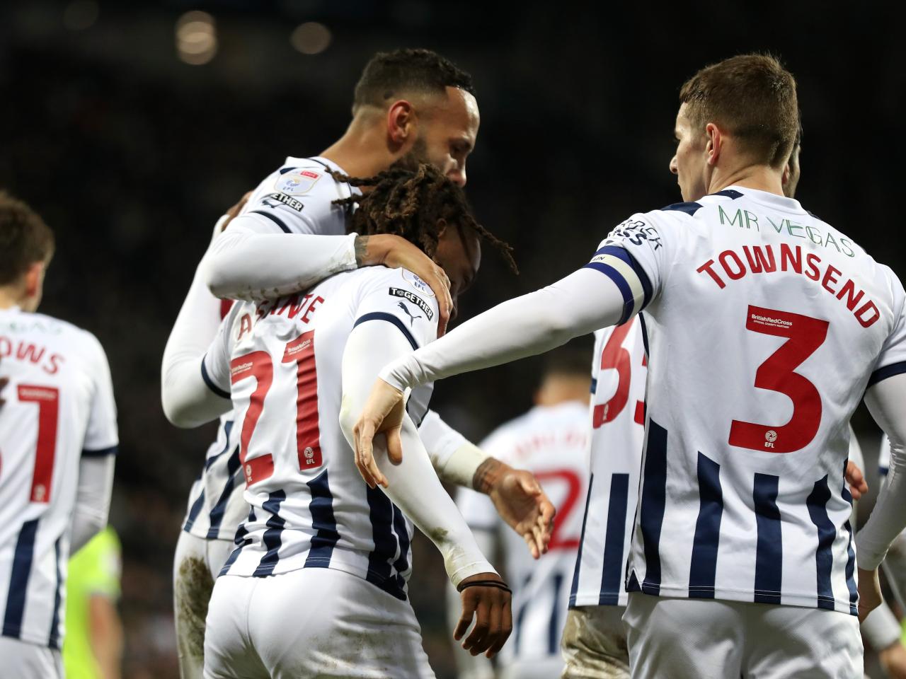 Brandon Thomas-Asante celebrates scoring his second against Blackburn with team-mates