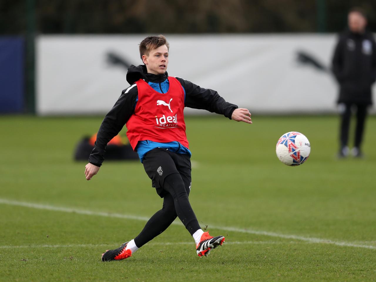 Fenton Heard strikes a ball in training 