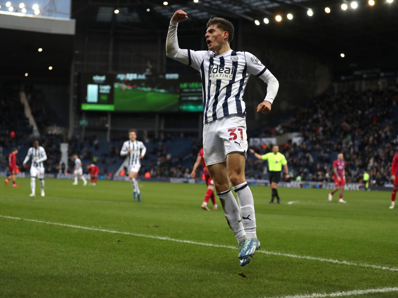 Tom Fellows celebrates scoring against Aldershot