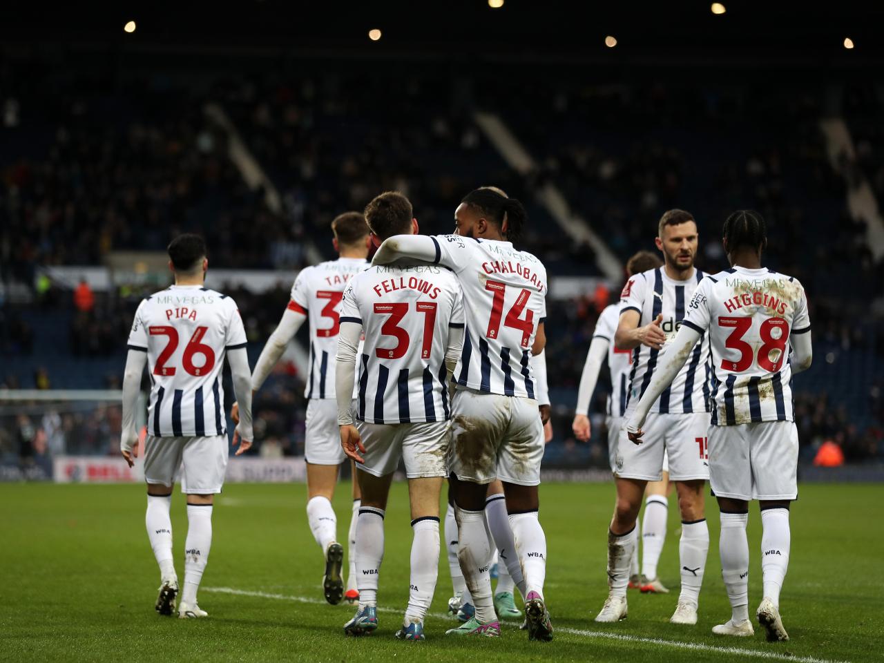 Tom Fellows celebrates scoring against Aldershot with team-mates