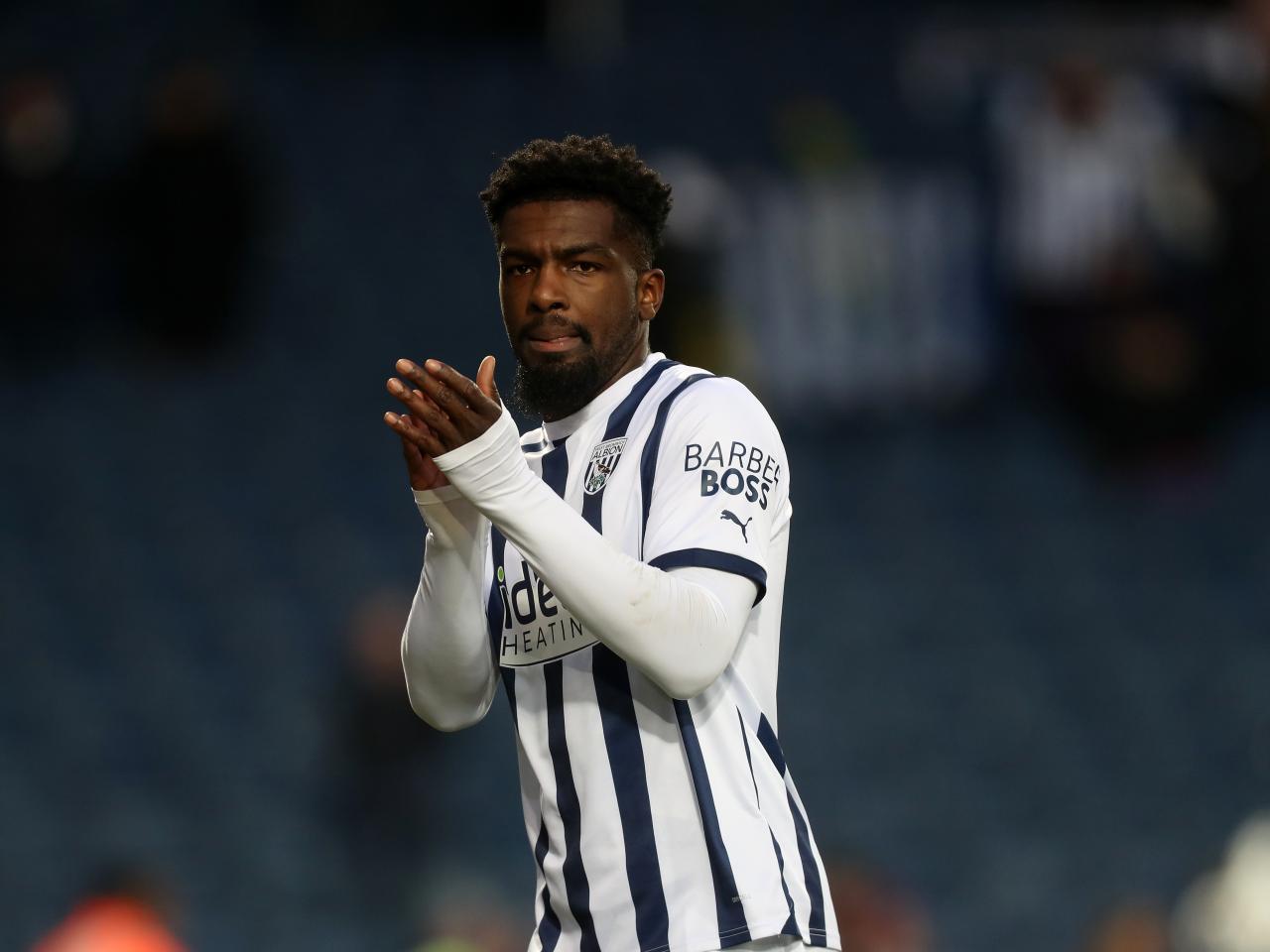 Cedric Kipre applauds supporters after the Aldershot game