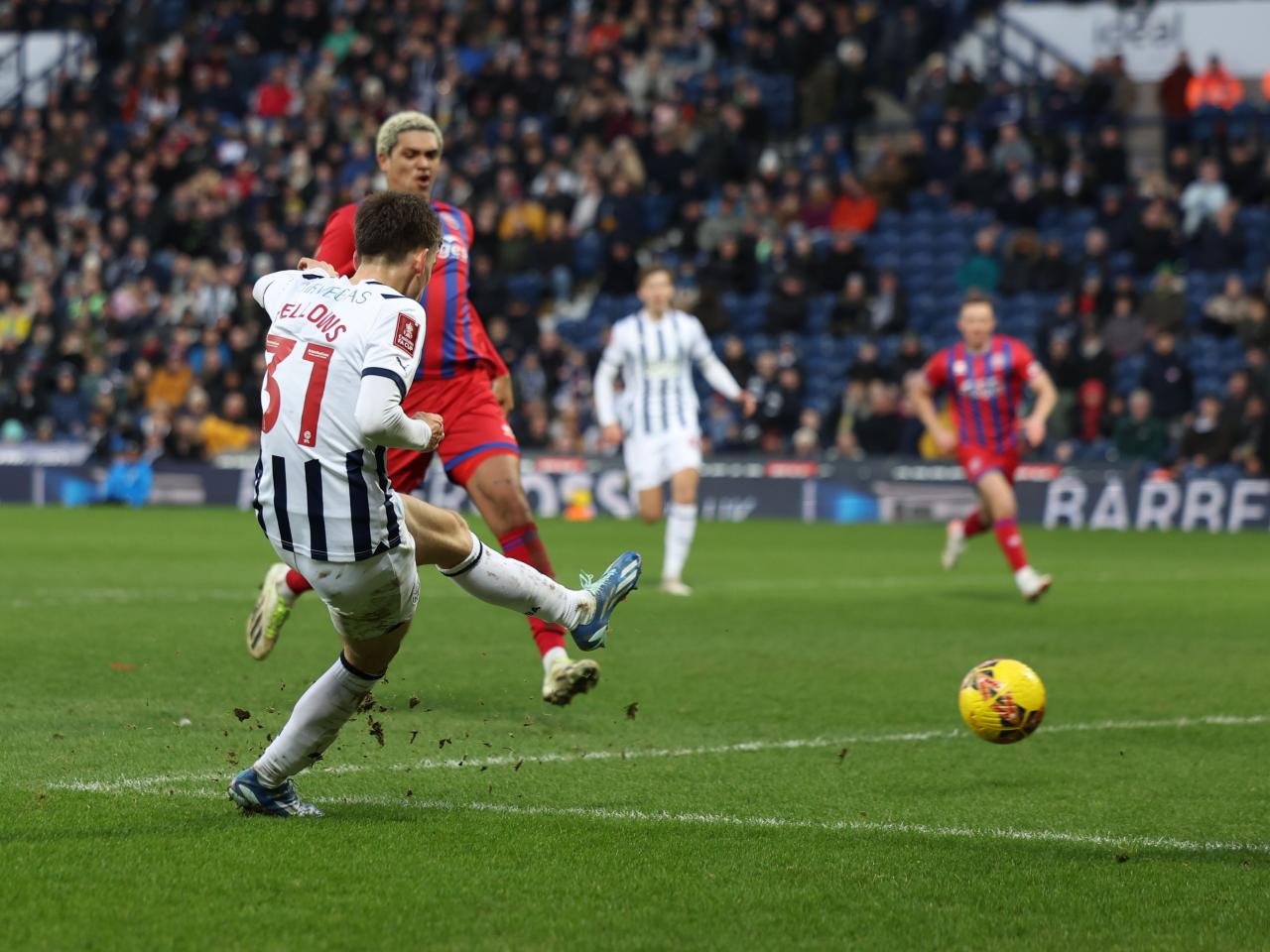 Tom Fellows shoots and scores against Aldershot