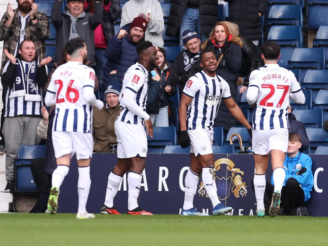 Jovan Malcolm celebrates scoring against Aldershot with team-mates