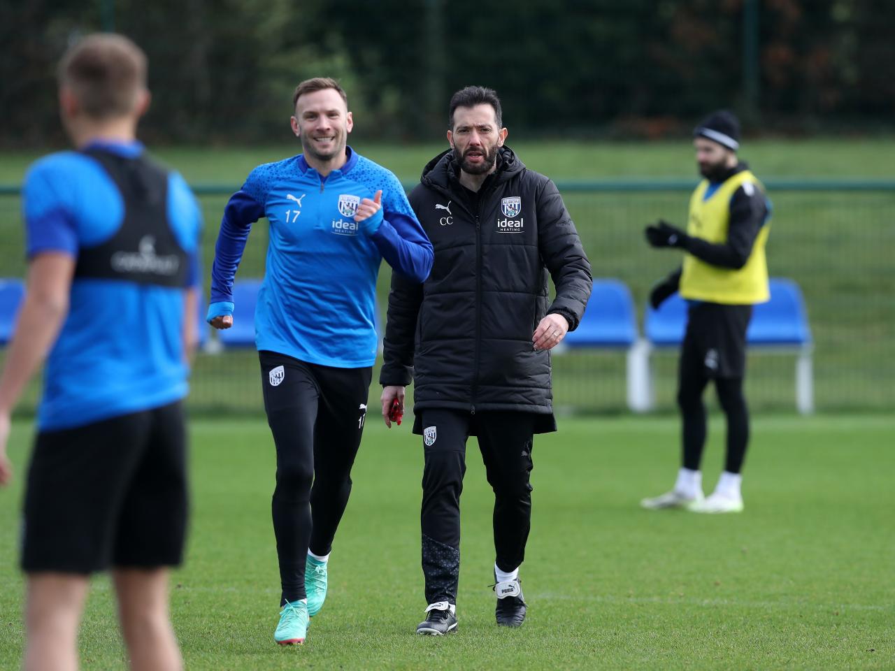 Carlos Corberán stood next to Andi Weimann on the training pitch
