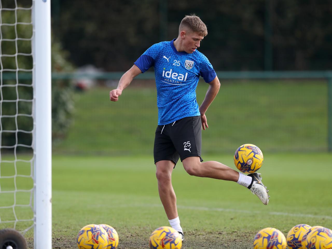 Callum Marshall flicking a ball up during a training session