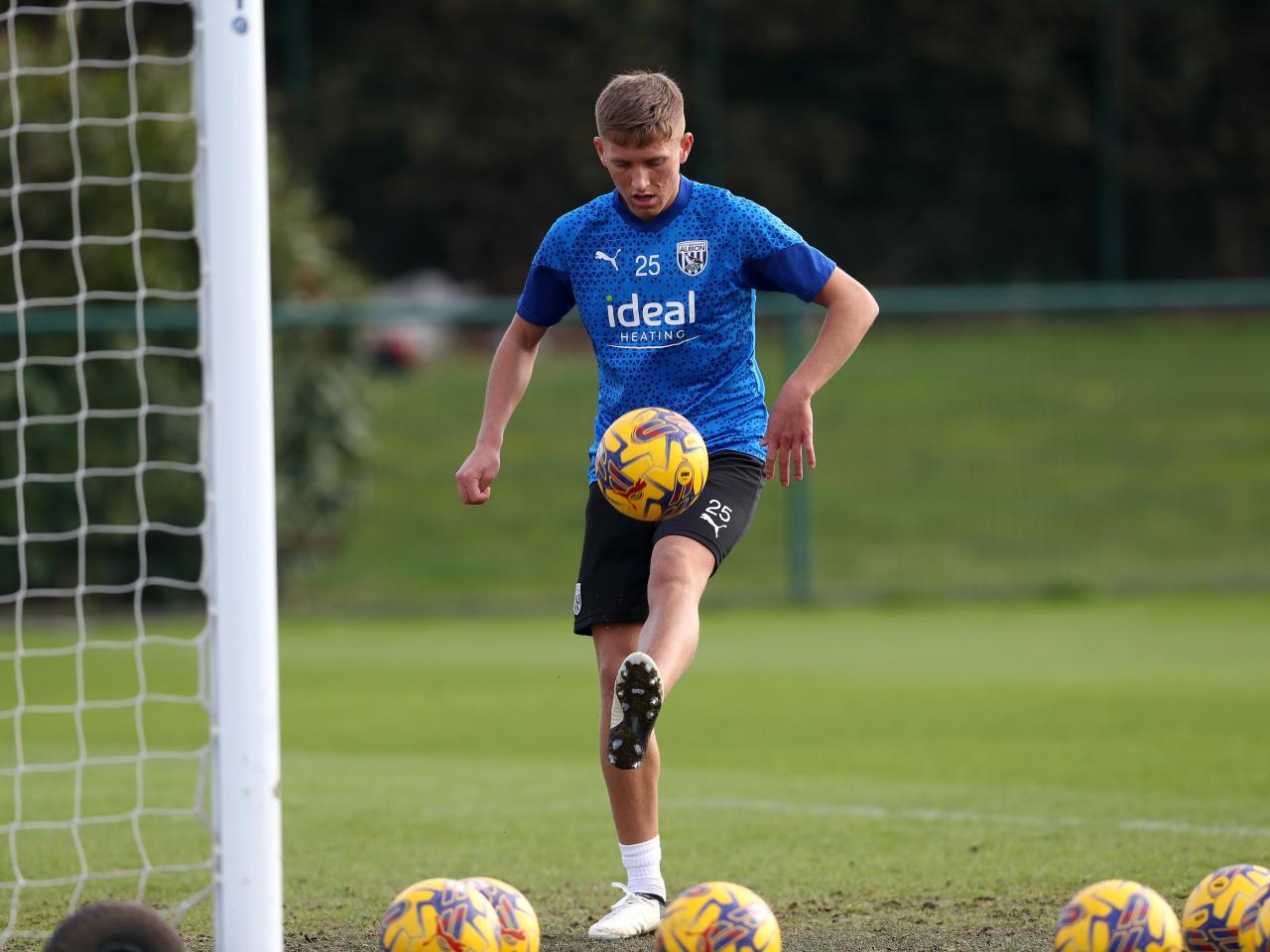 Callum Marshall flicking a ball up during a training session