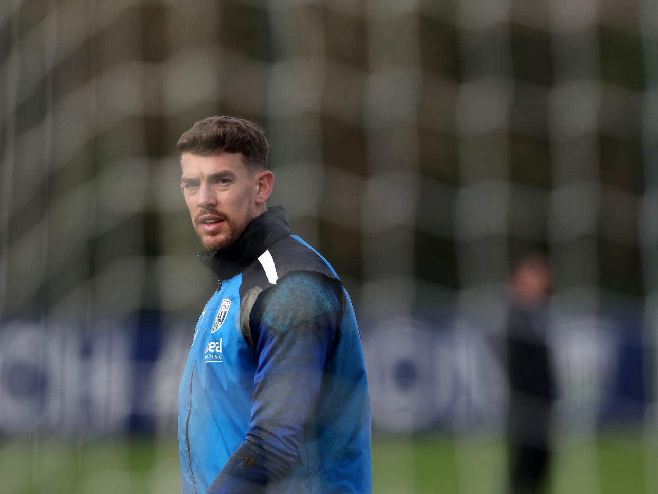 Alex Palmer looking towards the camera during a training session