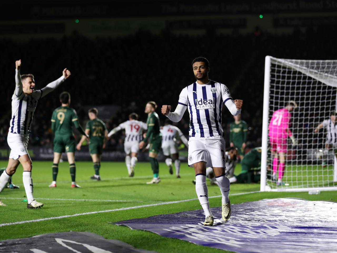 Darnell Furlong celebrates Cedric Kipre's goal against Plymouth