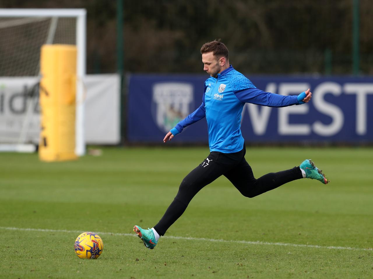 Andi Weimann striking a ball during a training session