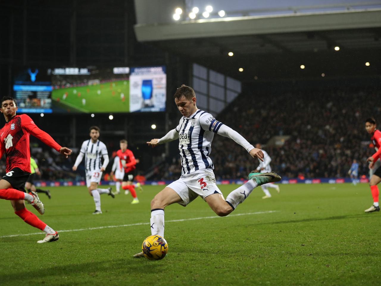 Conor Townsend crosses the ball against Blues