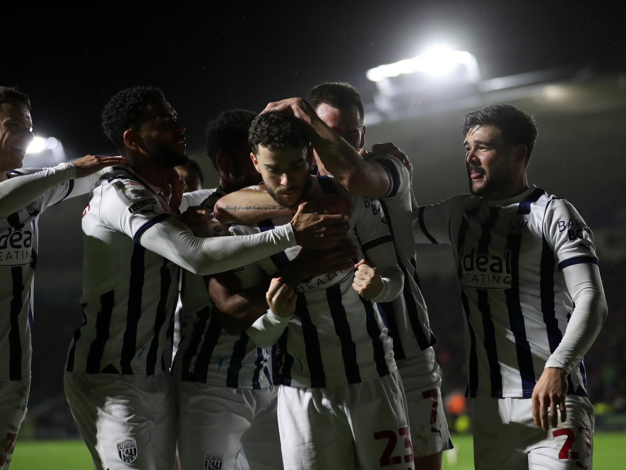 Mikey Johnston celebrates scoring against Plymouth with several team-mates