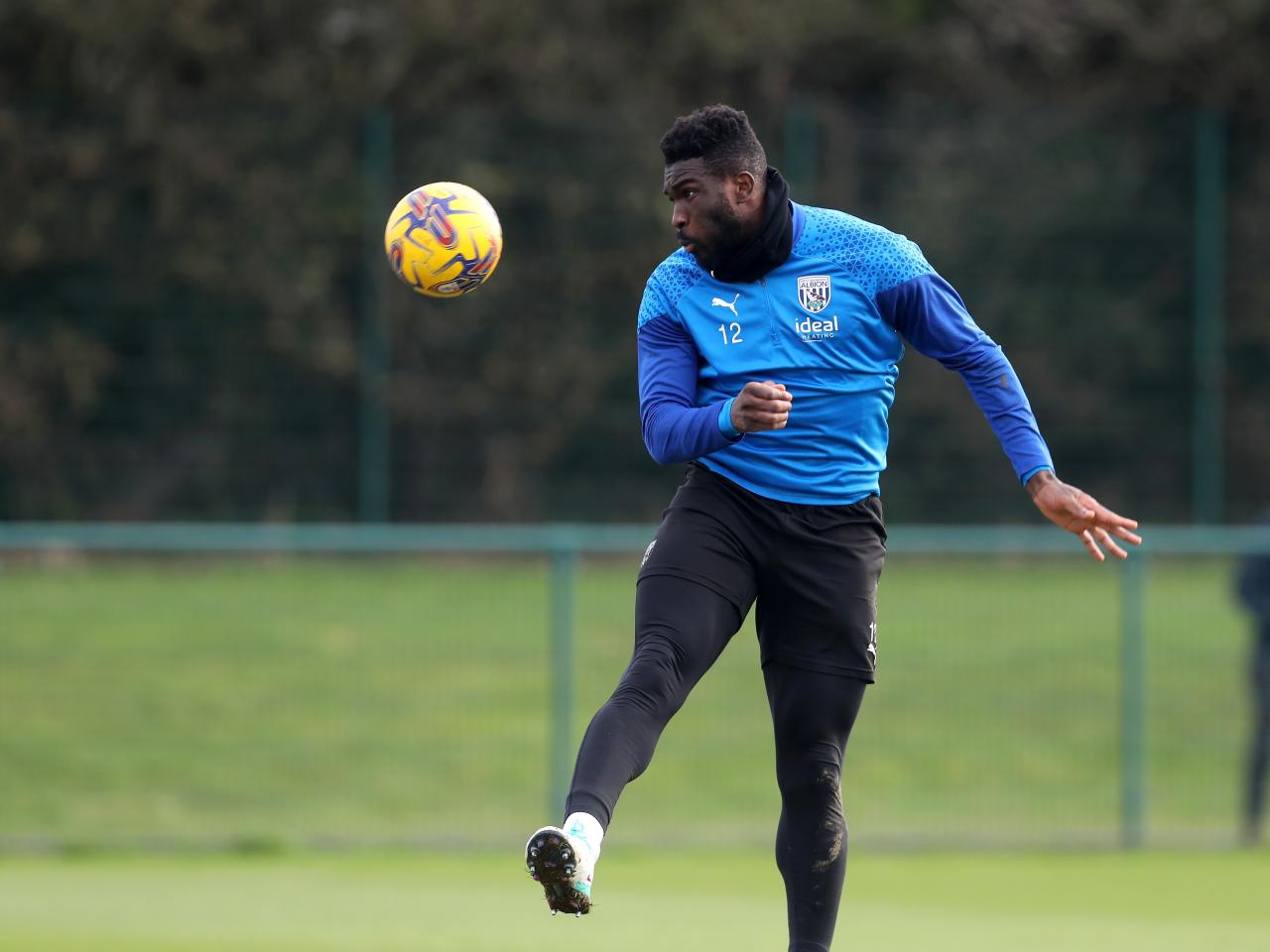 Daryl Dike heading the ball in training