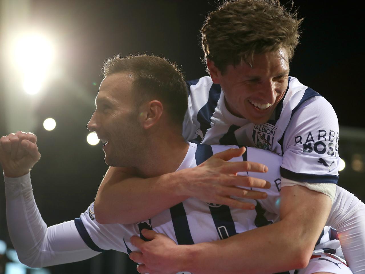 Andi Weimann celebrates scoring against Cardiff with Adam Reach