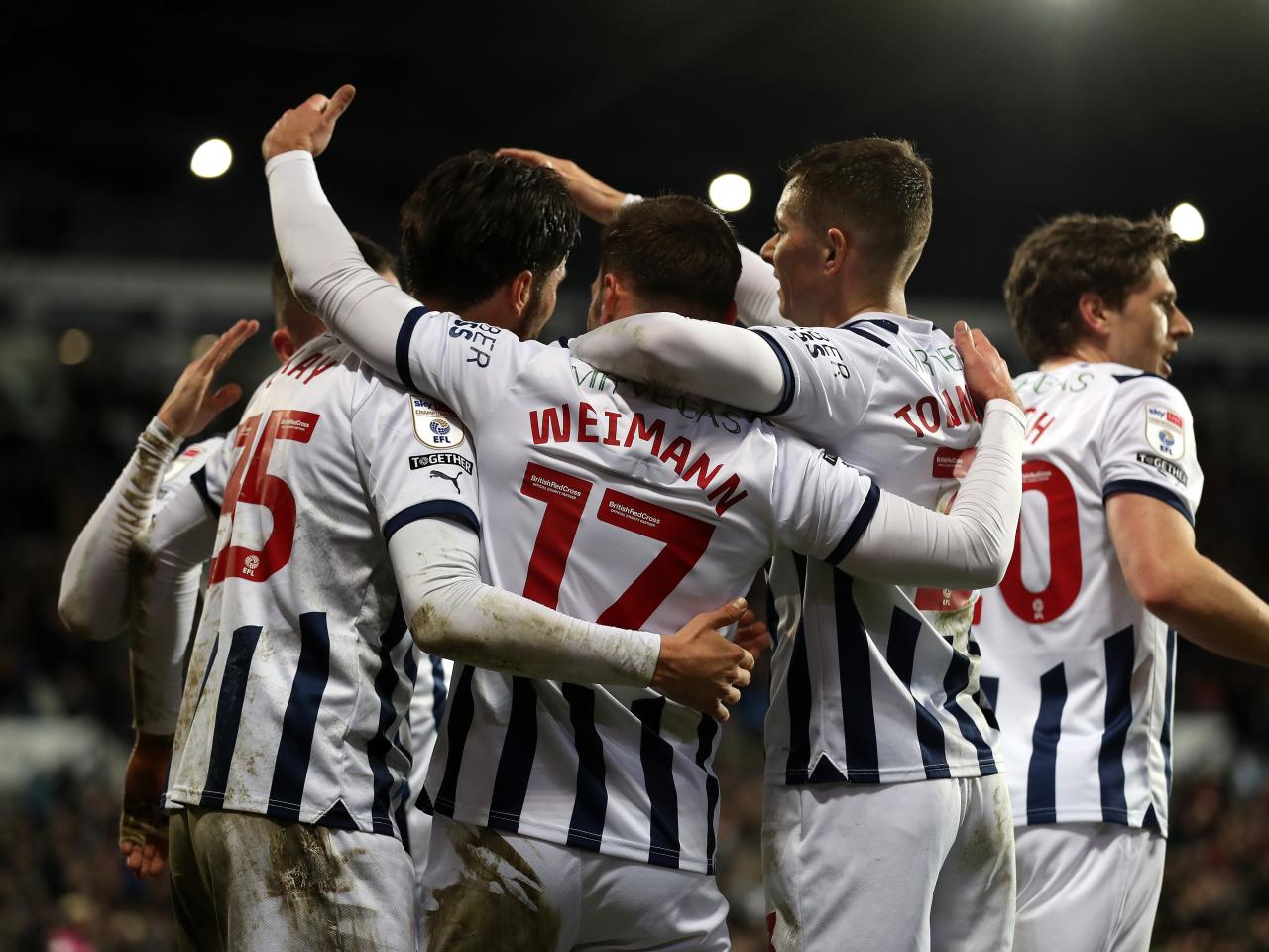 Andi Weimann celebrates scoring against Cardiff with team-mates