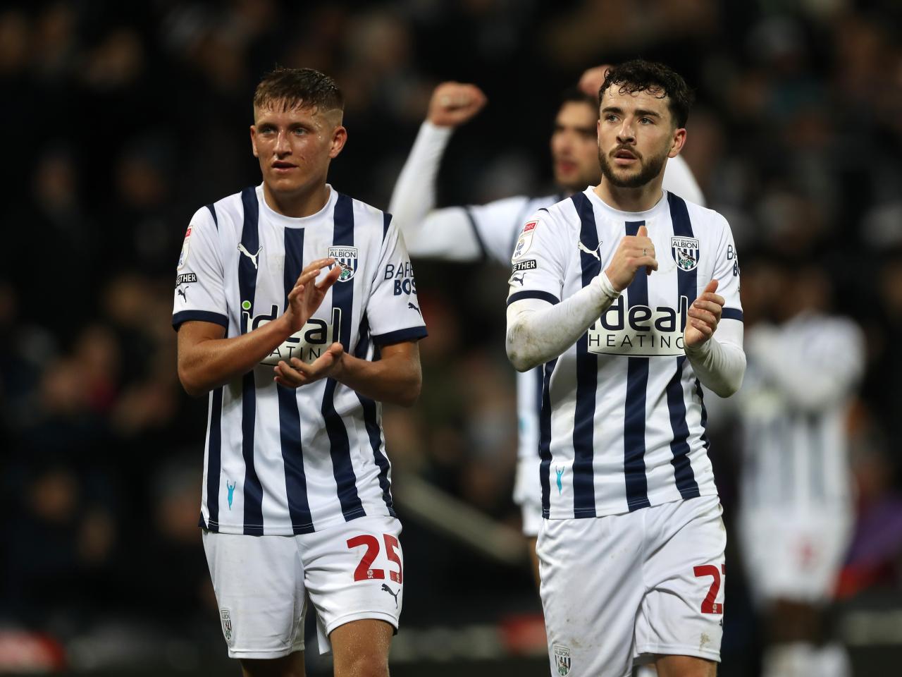Callum Marshall and Mikey Johnston applaud Albion fans after beating Blues