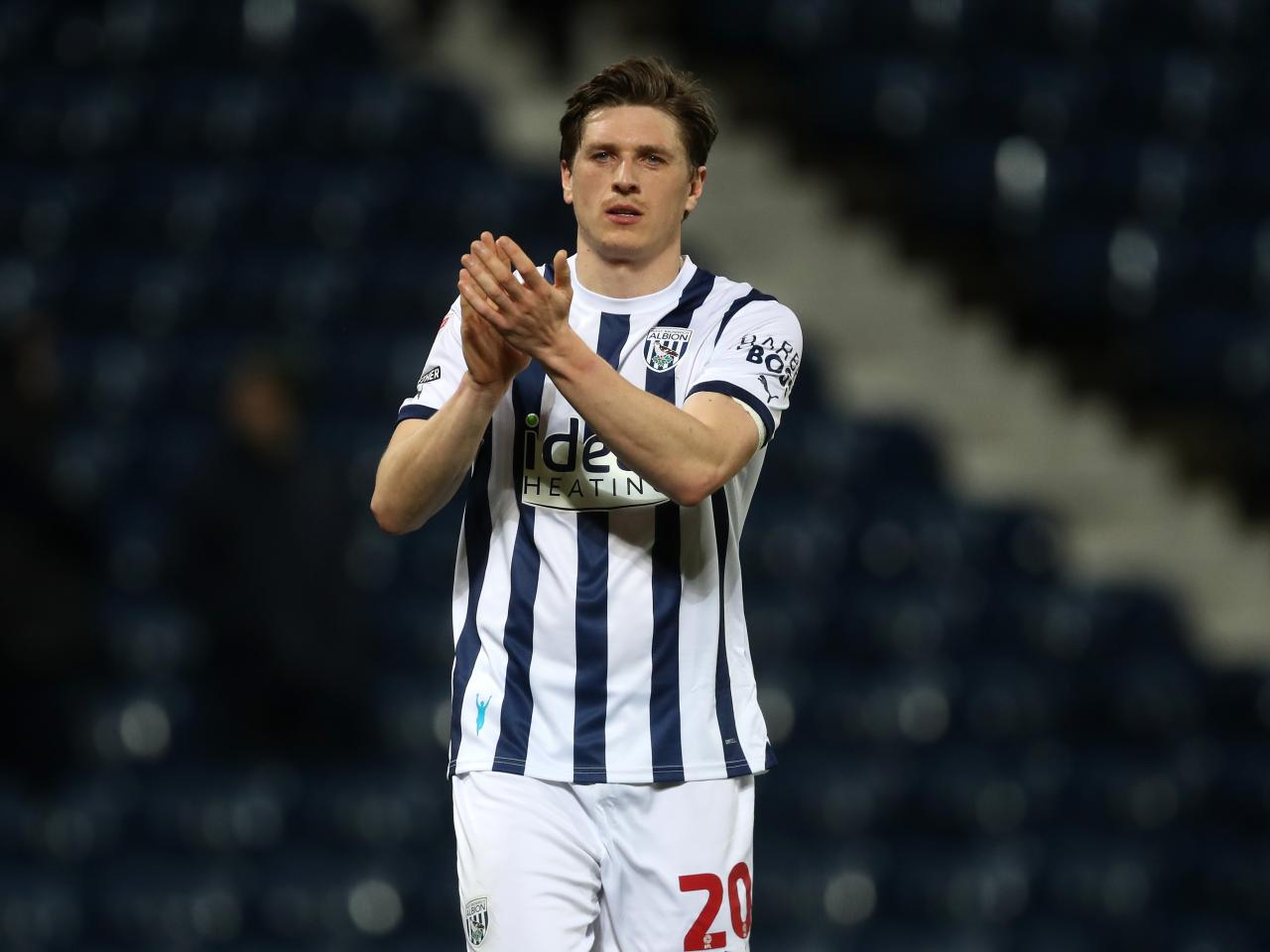 Adam Reach applauds Albion fans after beating Cardiff 