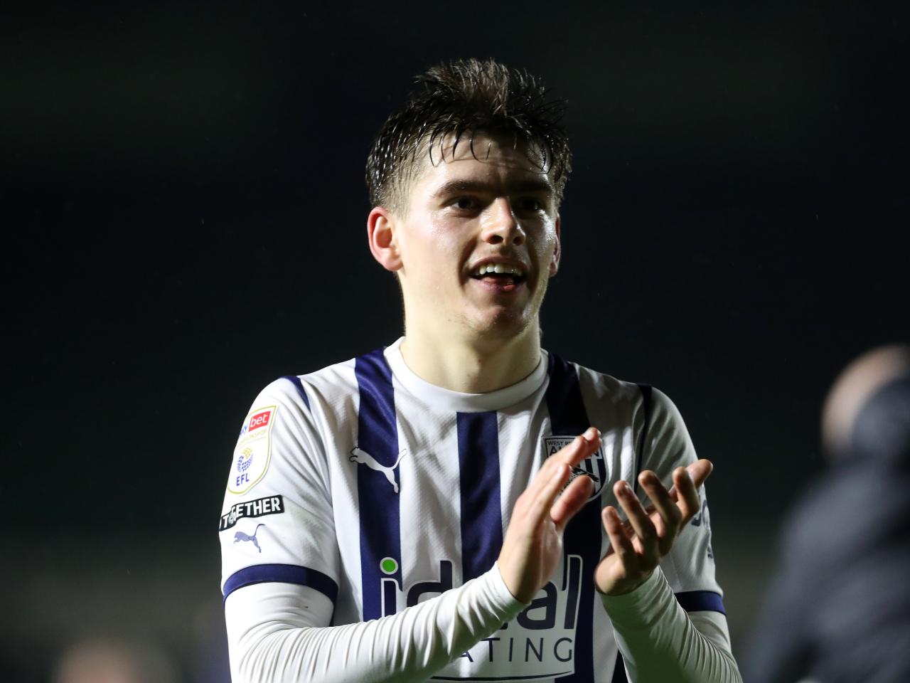 Tom Fellows applauds Albion fans after the full-time whistle at Plymouth