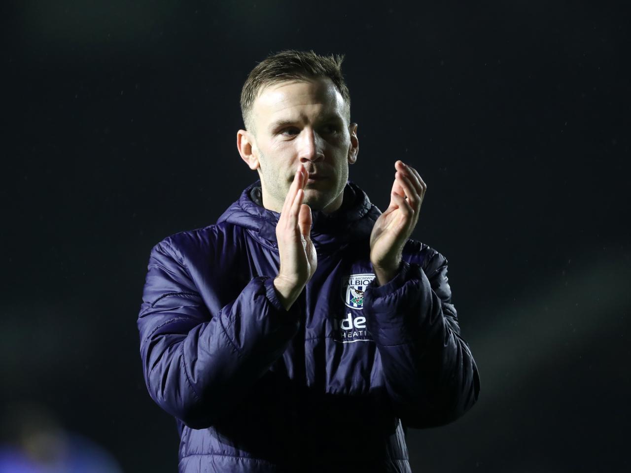 Andi Weimann applauds Albion fans after the full-time whistle at Plymouth