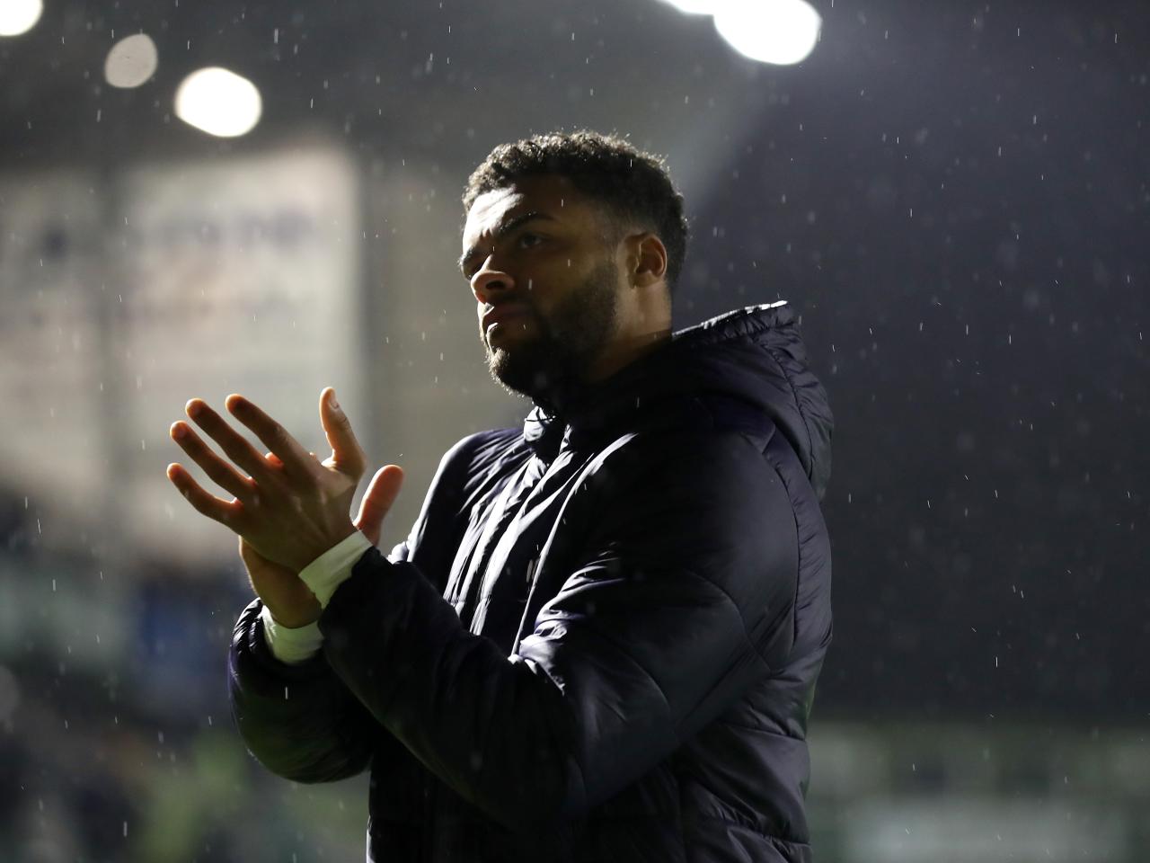 Darnell Furlong applauds Albion fans after the full-time whistle at Plymouth