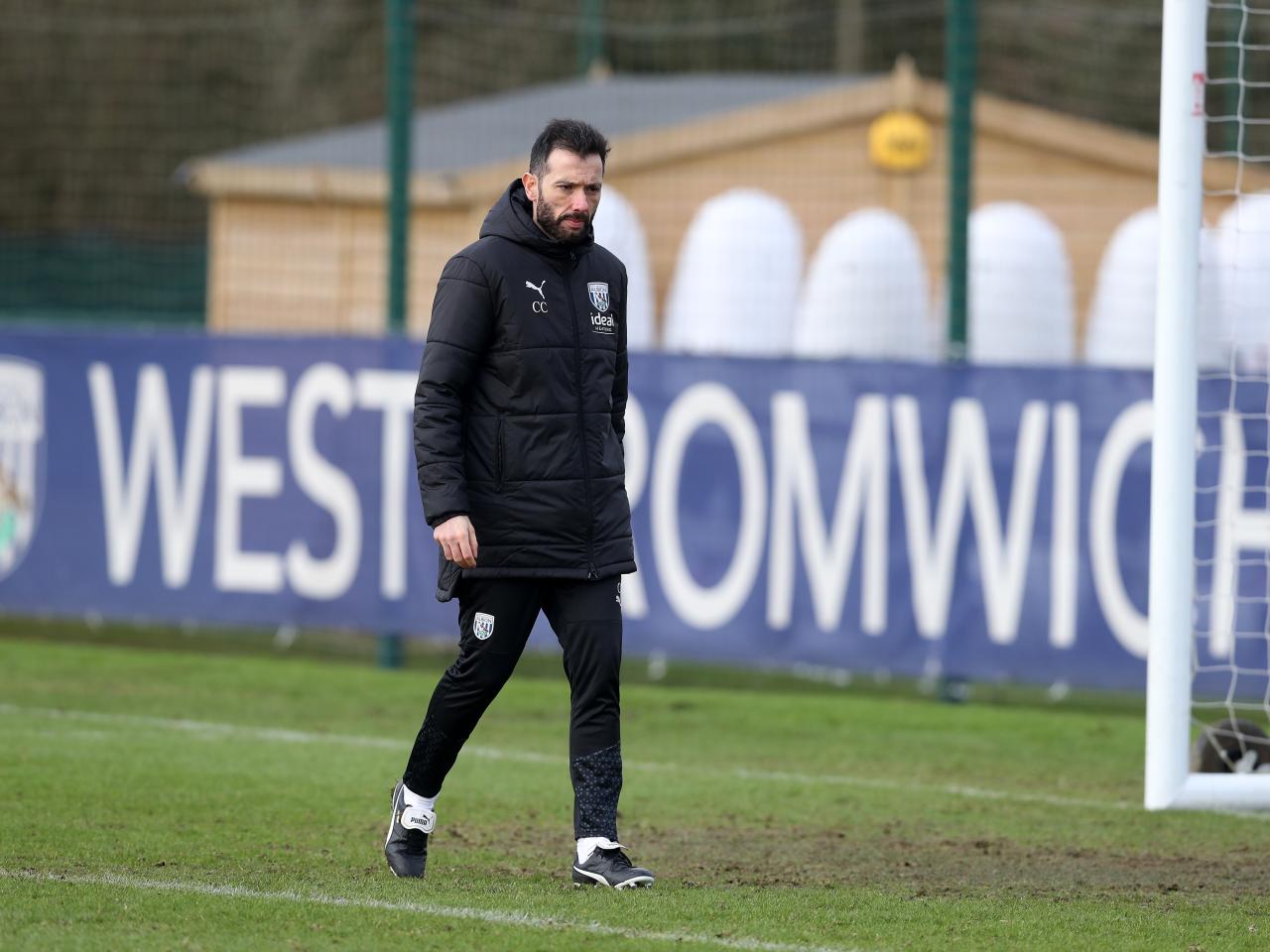 Carlos Corberán on the training pitch in the middle of a session