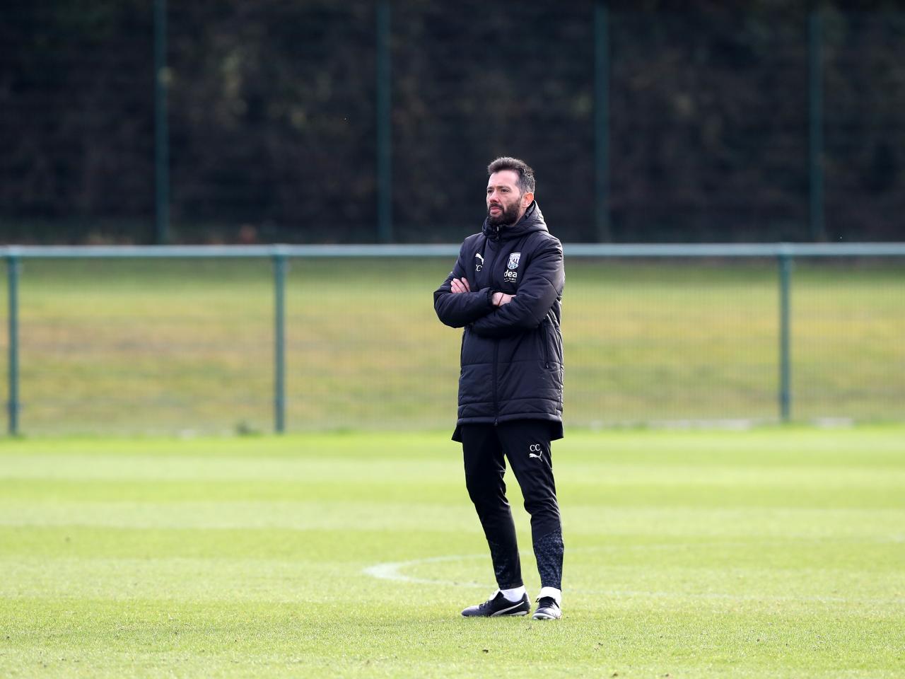 Carlos Corberán on the training pitch in the middle of a session