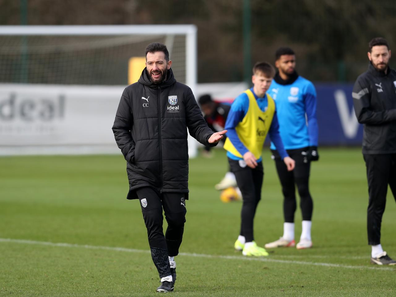 Carlos Corberán on the training pitch in the middle of a session