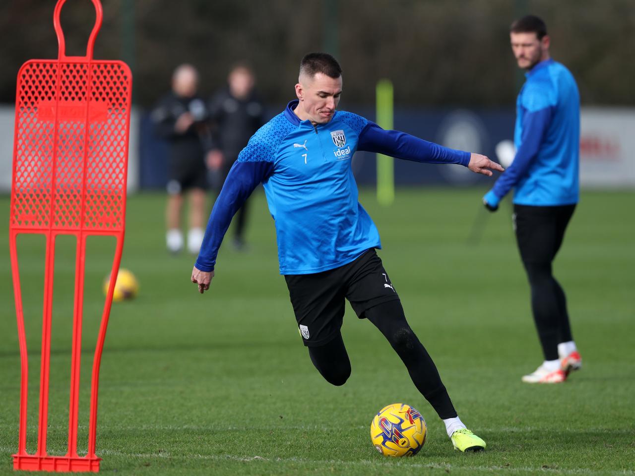 Jed Wallace shoots at goal during training