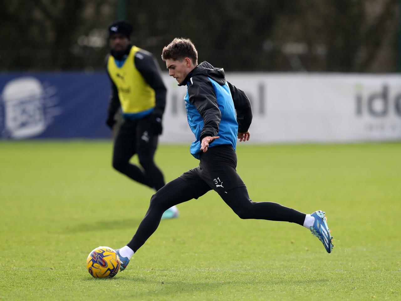 Tom Fellows on the ball during training 