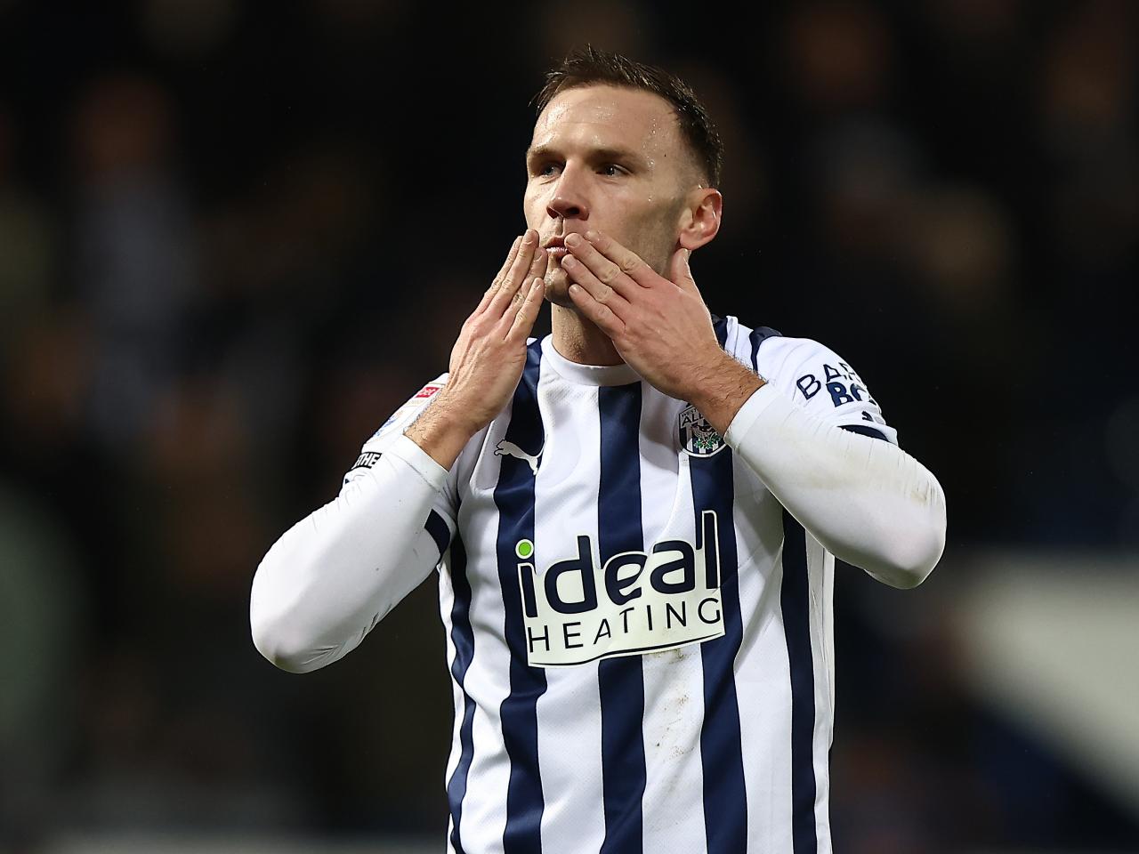 Andi Weimann blows supporters kisses at full-time